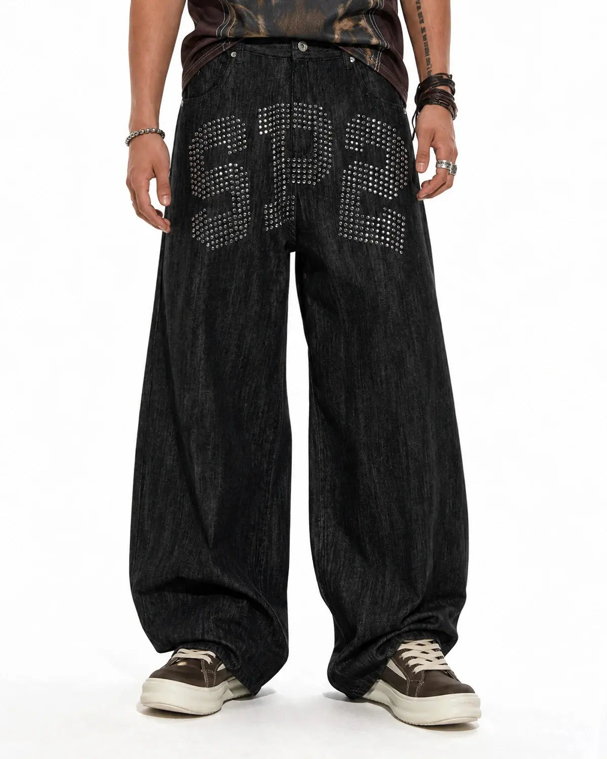 Inflation brand rhinestone number wide leg jeans, stylish streetwear pants with sparkling embellishments on a white background.