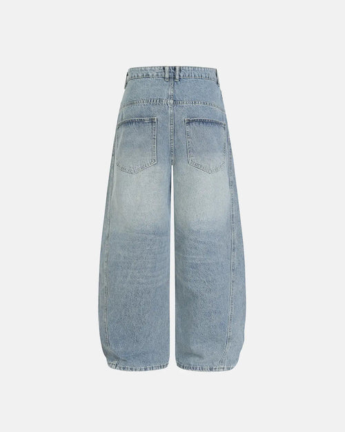 Inflation streetwear asymmetric button baggy jeans with oversized fit and unique button details, casual streetwear style.