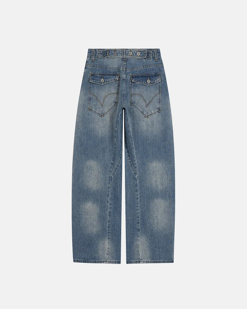 Flation Bamboo Weave Cinch Back Baggy Jeans showing relaxed fit, bamboo pattern, and cinch waist detail on light denim fabric.