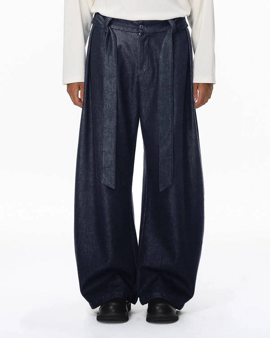 Raw silky denim jeans with belt from Flation Streetwear, featuring a stylish fit and detailed stitching.
