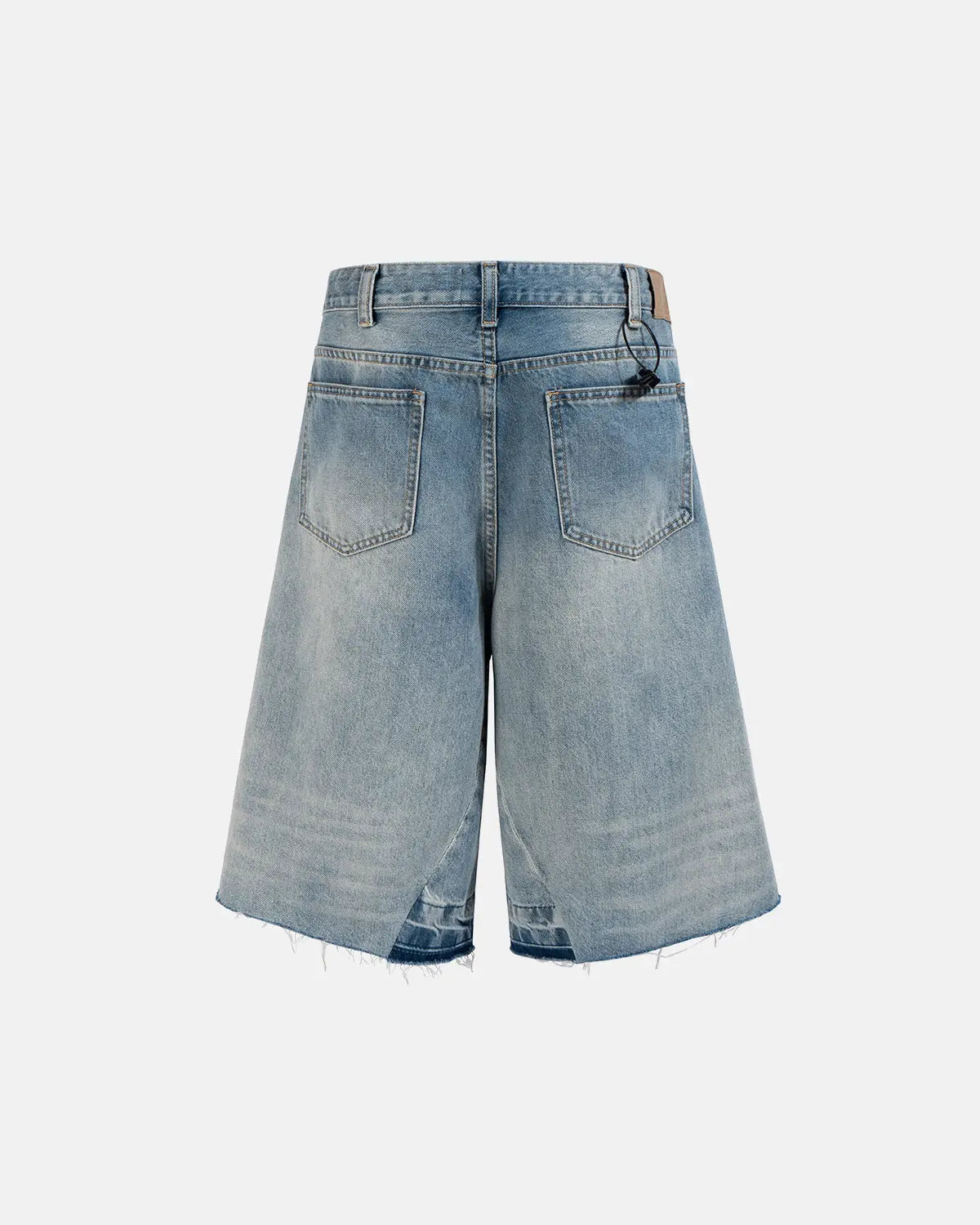 Inflation Streetwear frayed longline baggy jorts, casual denim pants with distressed frayed edges and oversized fit.