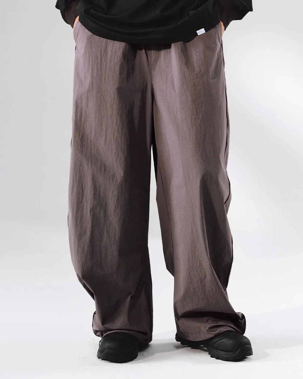 Inflation outdoor quick dry track pants shown on a model, featuring a lightweight, breathable design ideal for activewear and outdoor activities.