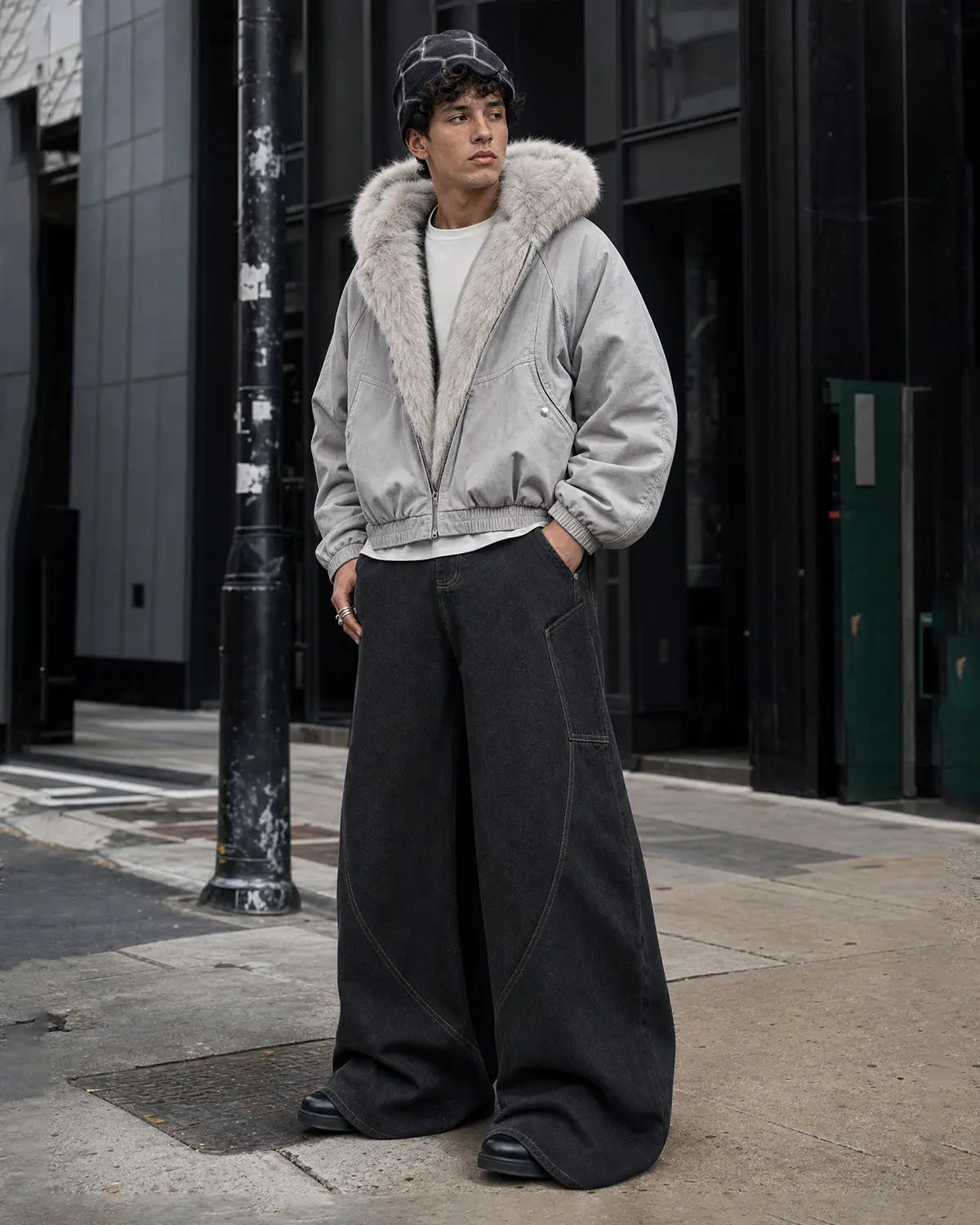 Inflation Streetwear faux fur-lined bomber hooded jacket displayed on a model, showcasing its stylish design and cozy collar.