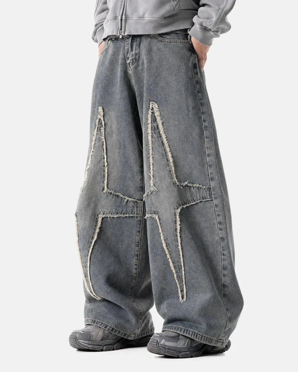 Flation Star Patched Baggy Jeans featuring distressed details and a relaxed fit, perfect for streetwear style