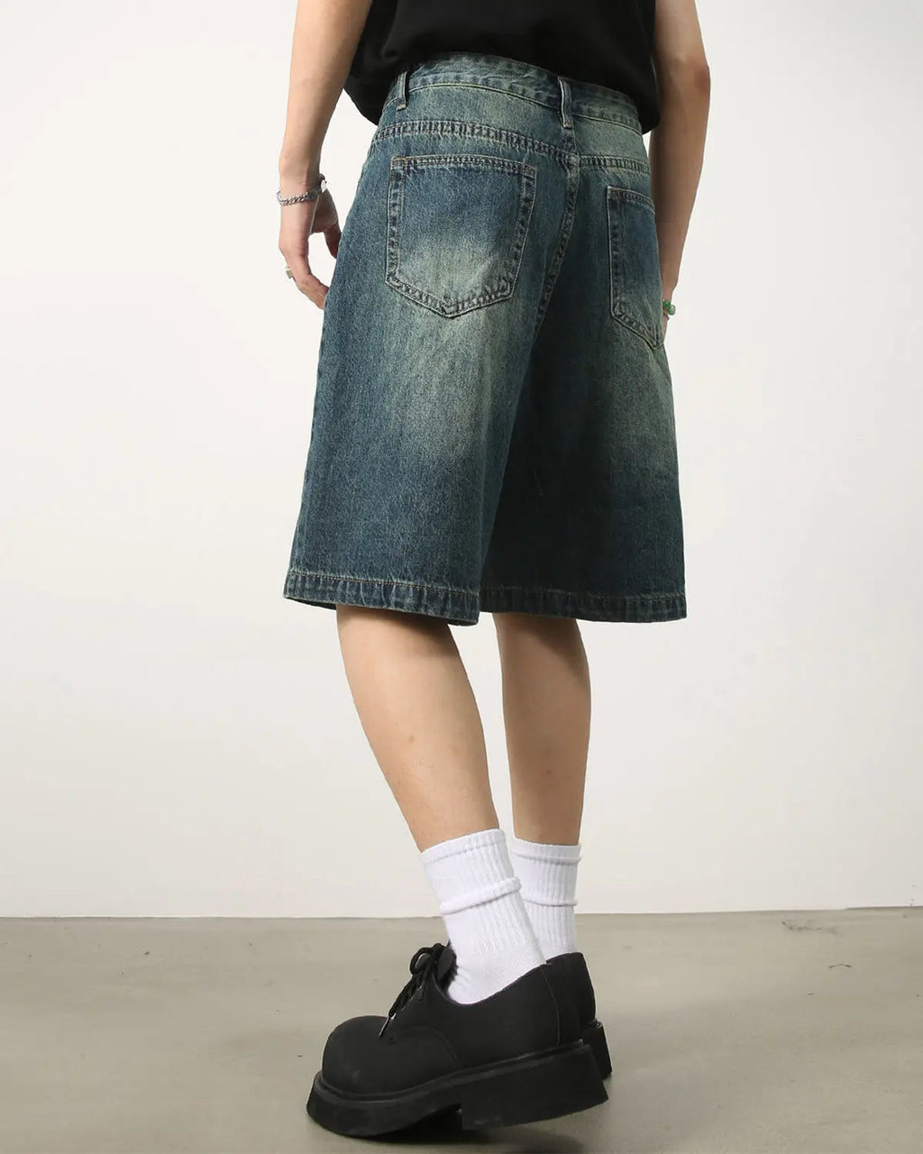 Washed knee-length denim jorts from Inflation Streetwear, casual pants with a relaxed fit and distressed denim style.