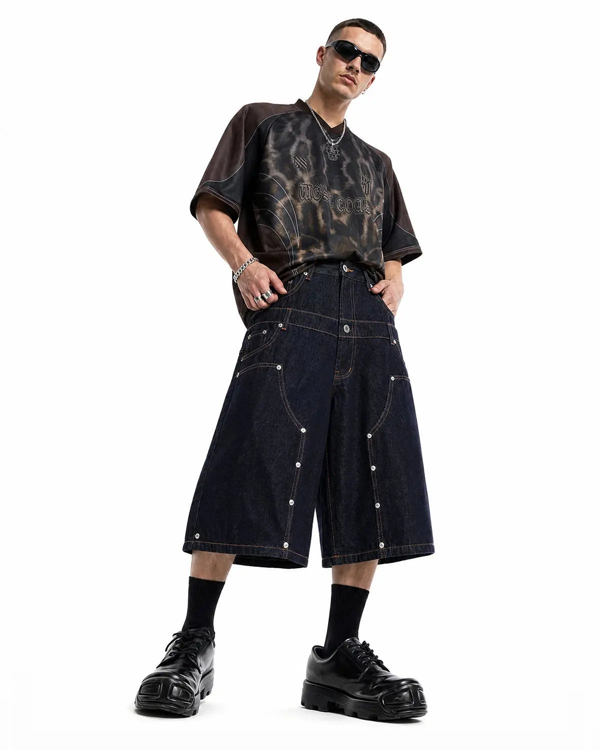 Inflation streetwear double waist rivet baggy jorts, casual denim pants with rivet accents and relaxed fit, front view.