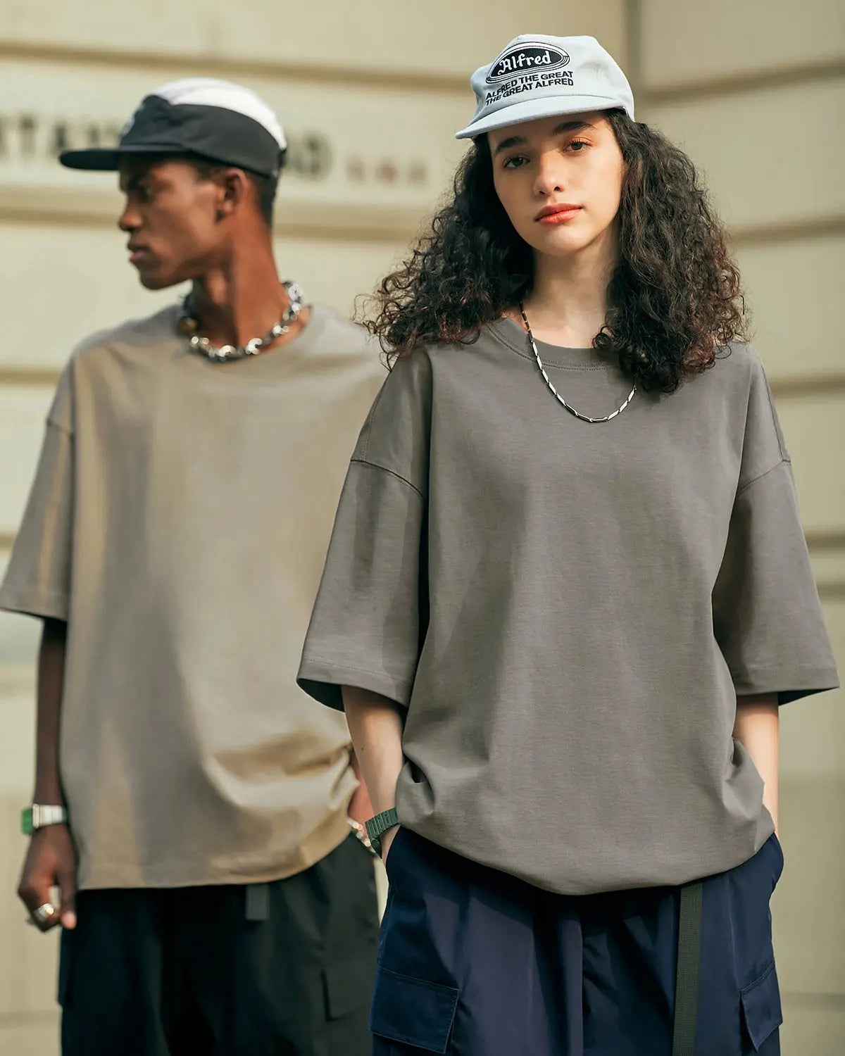 InflationUS oversized heavyweight cotton T-shirt with relaxed fit, displayed on a hanger showcasing its soft, durable fabric and streetwear style.