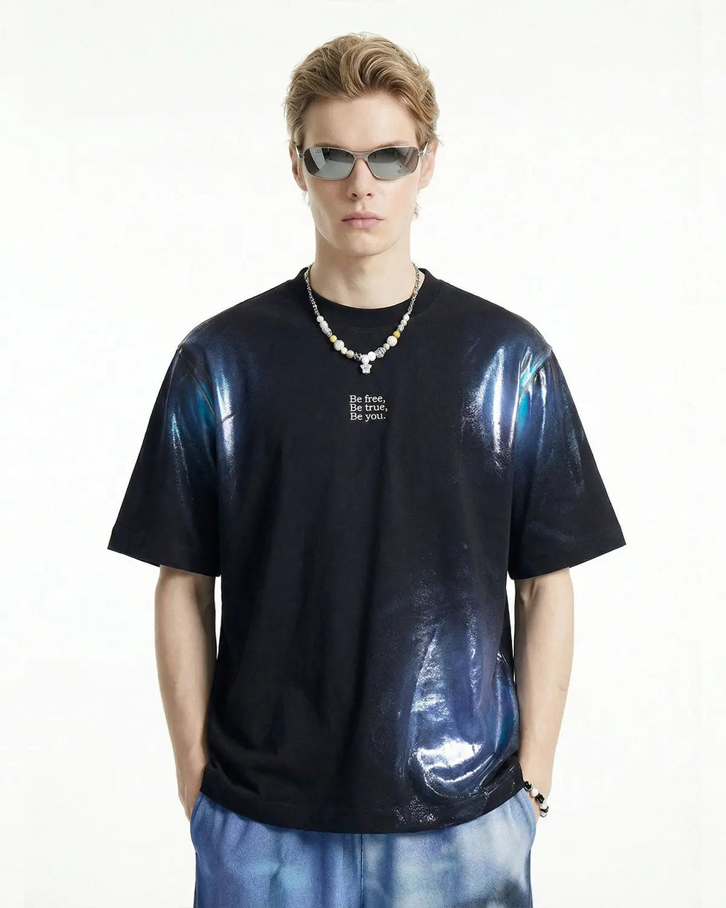 Iridescent shimmer oversized T-shirt from Inflation Streetwear, featuring a reflective iridescent fabric and relaxed fit.