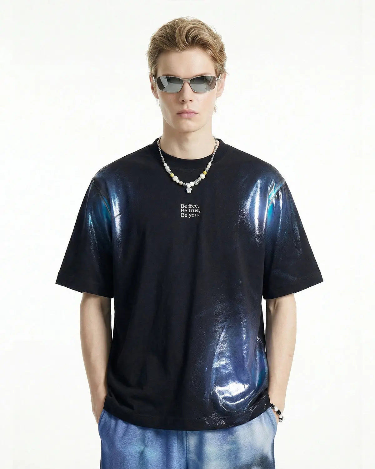Iridescent shimmer oversized T-shirt from Inflation Streetwear, featuring a reflective iridescent fabric and relaxed fit.