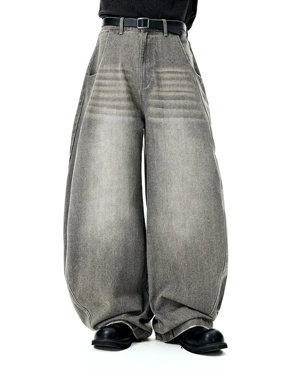 Flation Washed Barrel Baggy Jeans displayed on a model, showcasing relaxed fit and stylish washed denim look.