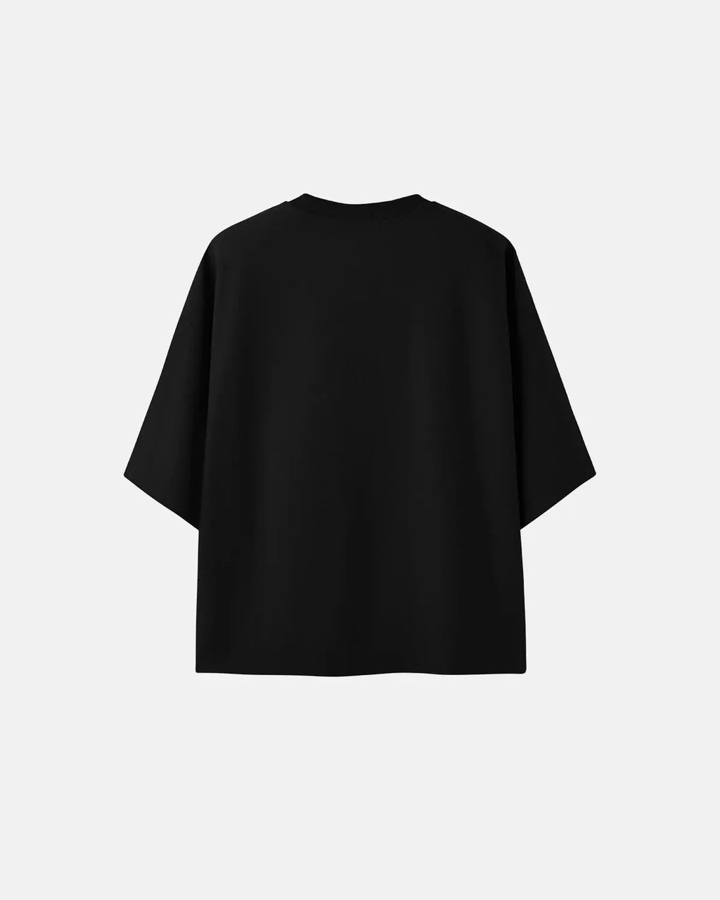 Blank oversized boxy T-shirt from Flation Streetwear, showing a relaxed fit in soft fabric, laid flat on a neutral background.