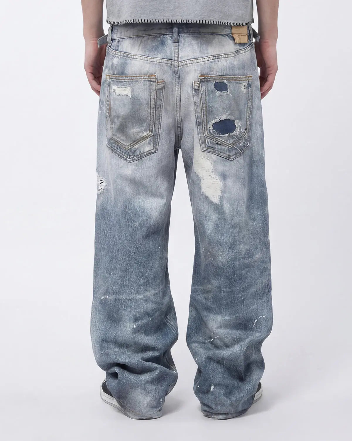 Layered digital print baggy jeans by INFLATION Streetwear featuring a relaxed fit and unique graphic design.
