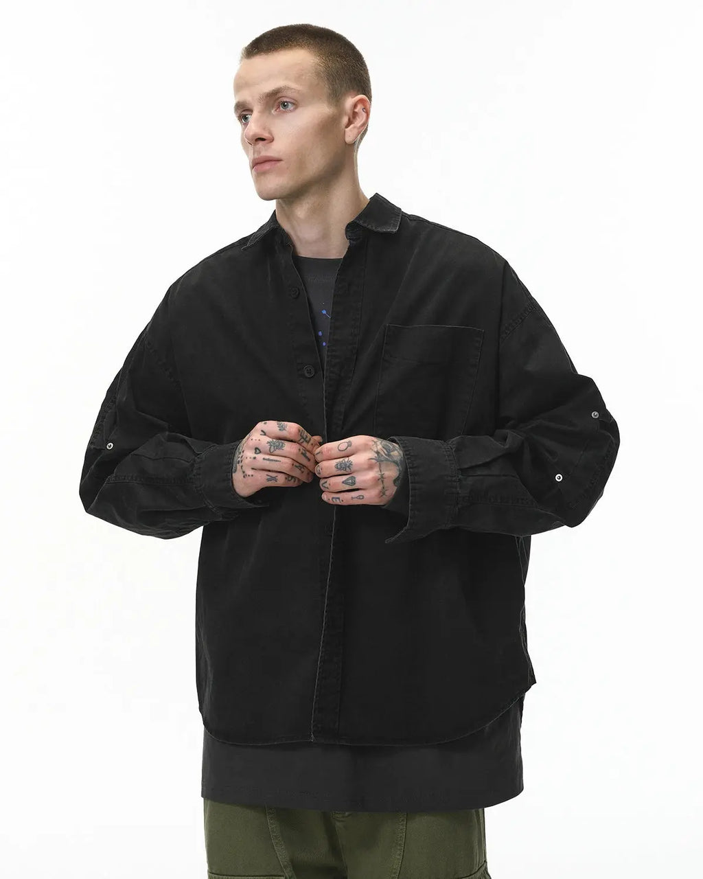 Acid wash cargo shirt jacket by Flation, featuring multiple pockets, distressed denim look, and relaxed streetwear style.
