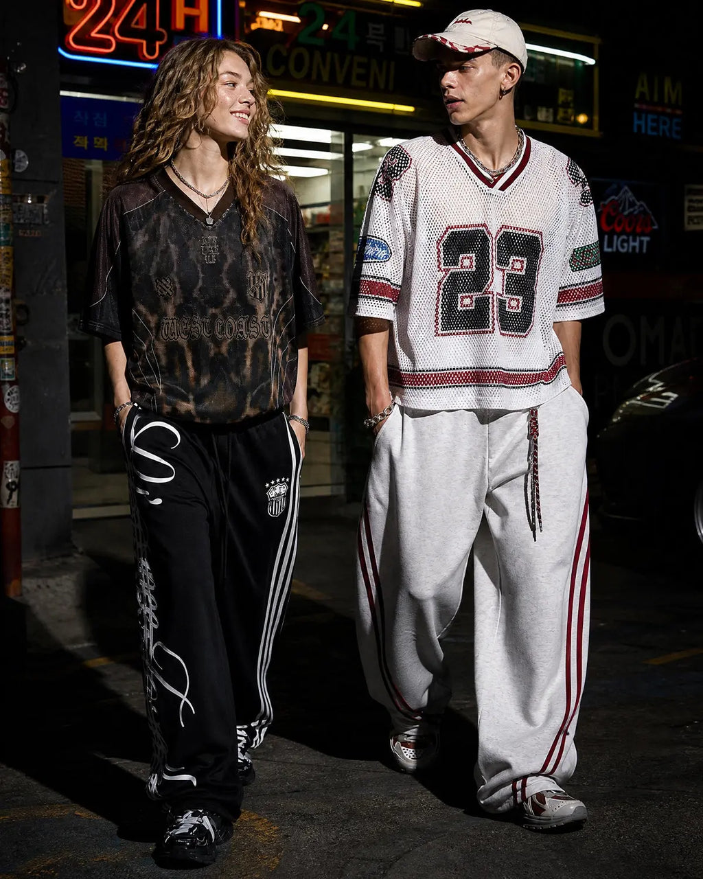Grey striped baggy sweatpants from INFLATION Streetwear, relaxed fit with bold striped pattern and comfortable fabric.