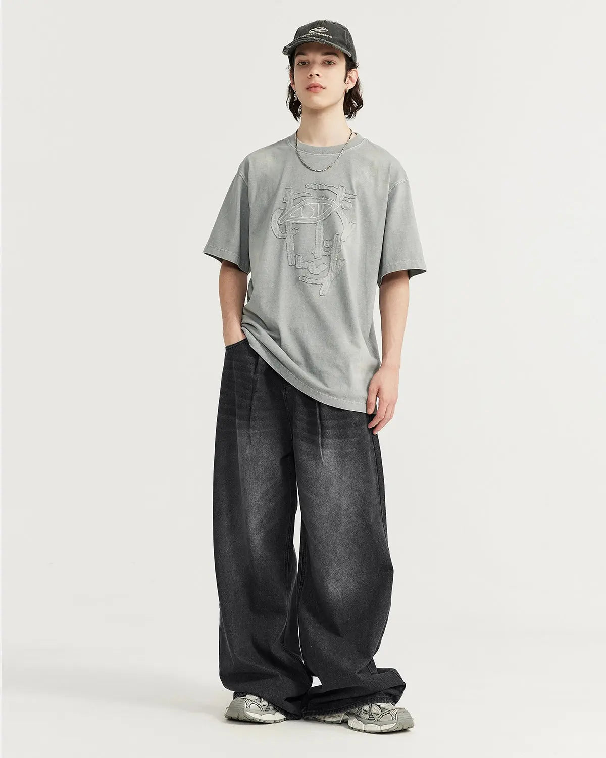 Flation Chill wide leg denim pants featuring relaxed fit and classic blue wash, styled with casual streetwear look.