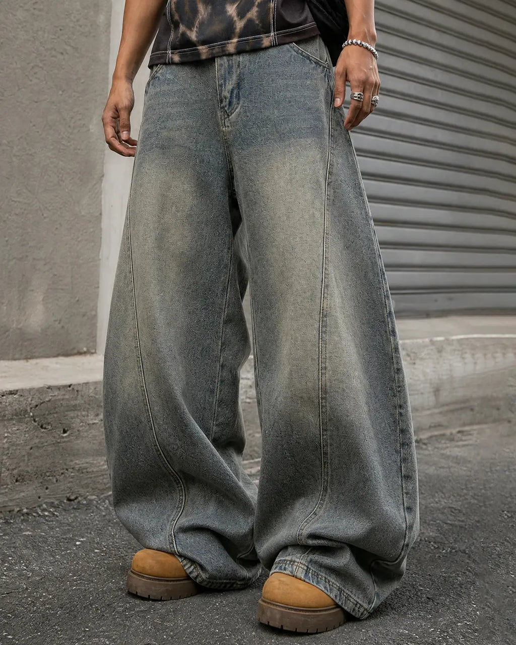 Flation Super Barrel Baggy Jeans, loose-fit streetwear pants with a relaxed style and tapered legs, shown in black.