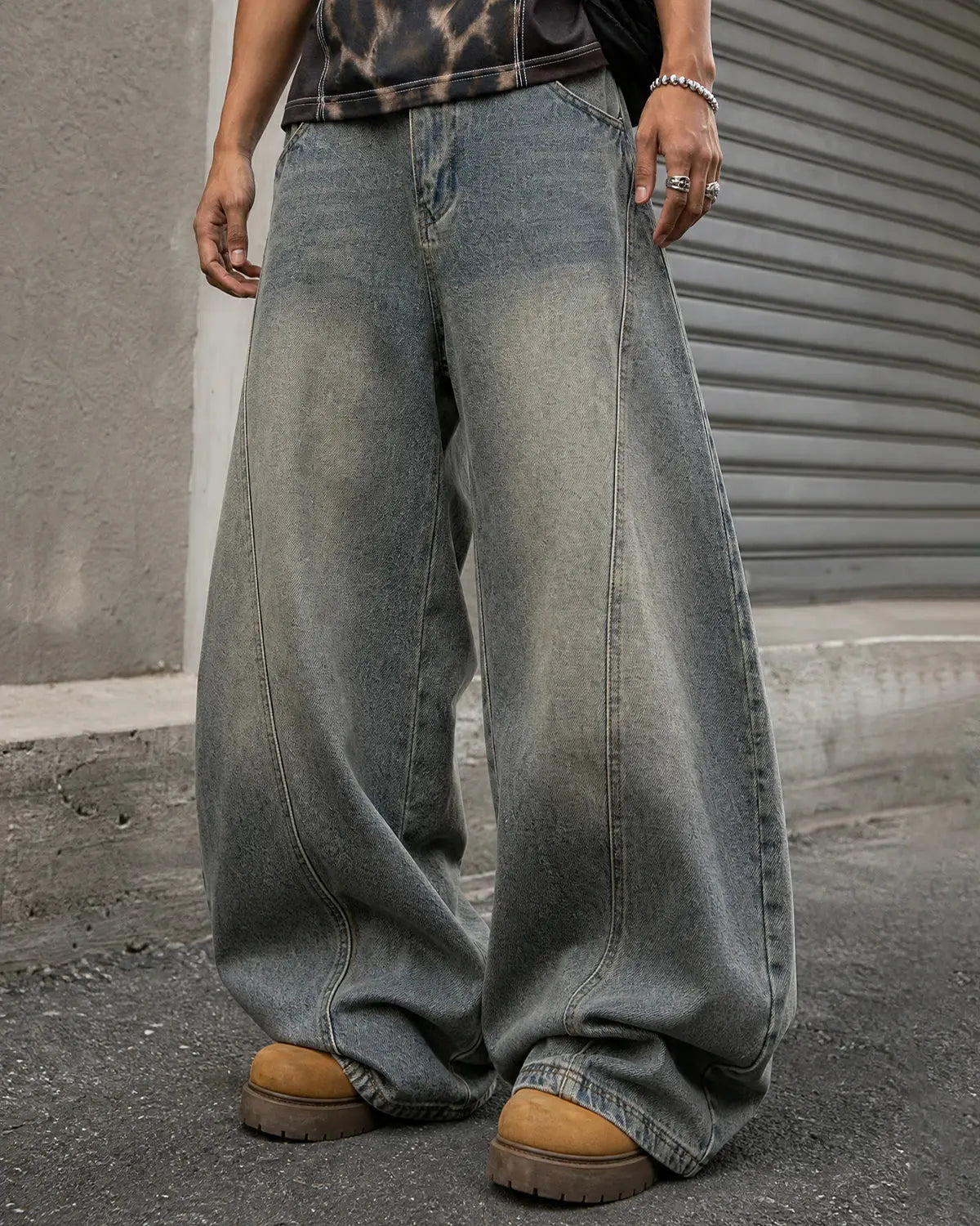 Flation Super Barrel Baggy Jeans, loose-fit streetwear pants with a relaxed style and tapered legs, shown in black.