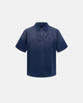 Distressed ripped washed polo shirt by INFLATION with a casual, faded appearance and ripped details, styled for streetwear fashion.