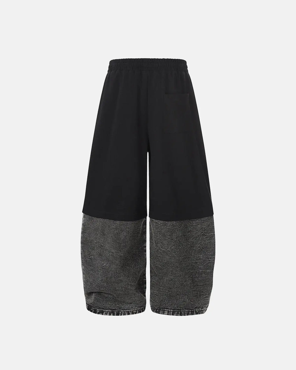 Denim patchwork barrel joggers from Inflation Streetwear with detachable patches and relaxed fit, displayed on a hanger.