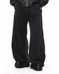 Acid washed black barrel jeans by Flation featuring a relaxed fit and distressed details, perfect for streetwear style.