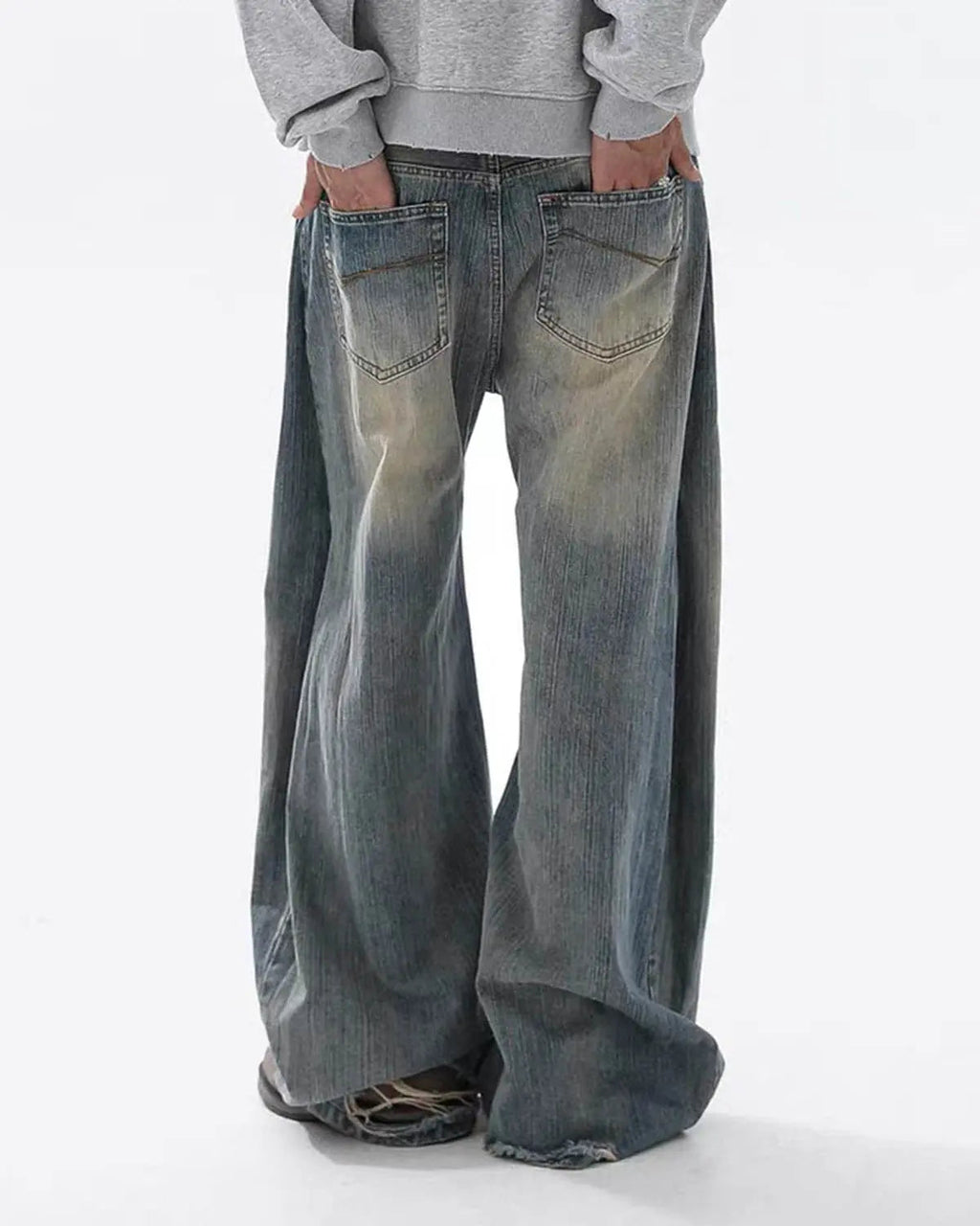 Washed bamboo weave baggy bootcut jeans by Flation with relaxed fit and textured fabric, featuring a casual streetwear style.