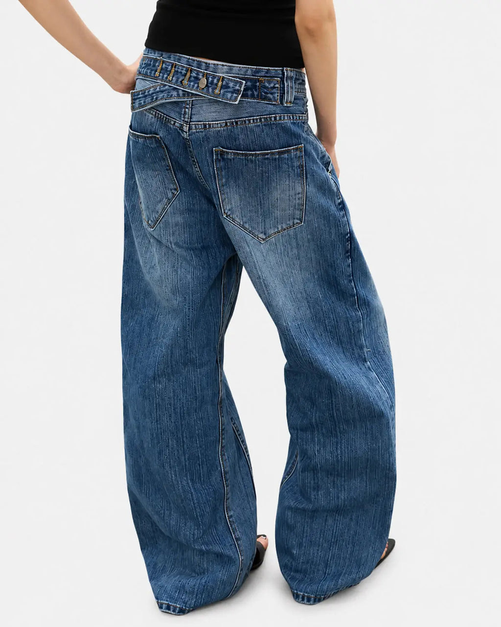 Adjustable waist bamboo weave baggy jeans by INFLATION, featuring a relaxed fit and textured fabric for streetwear style.