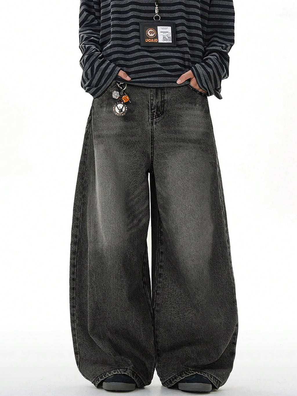 Inflation distressed vintage denim jeans with wide leg and loose fit, showcasing worn details and classic blue denim texture.