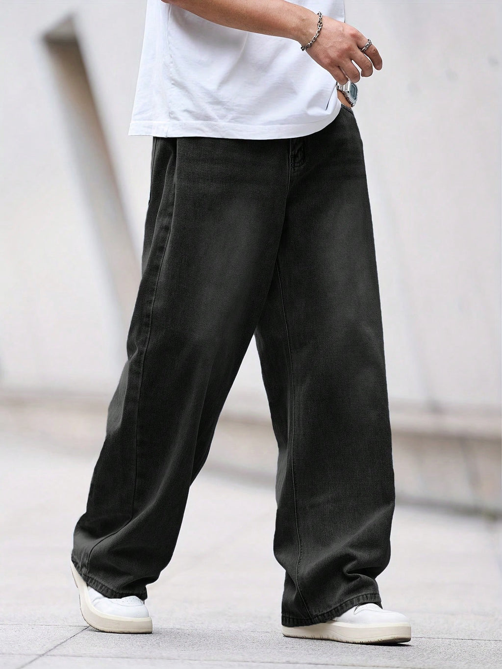 Black Flation street style loose denim jeans with relaxed fit and classic five-pocket design, casual and comfortable for everyday wear.