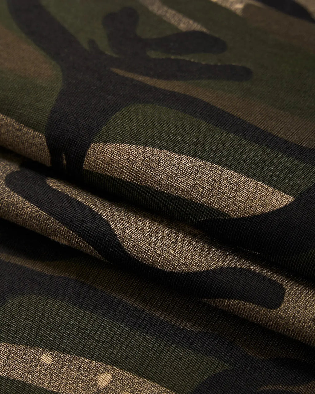 Flation boxy camo tee in khaki, streetwear style, featuring a relaxed fit and camouflage pattern on soft cotton fabric.