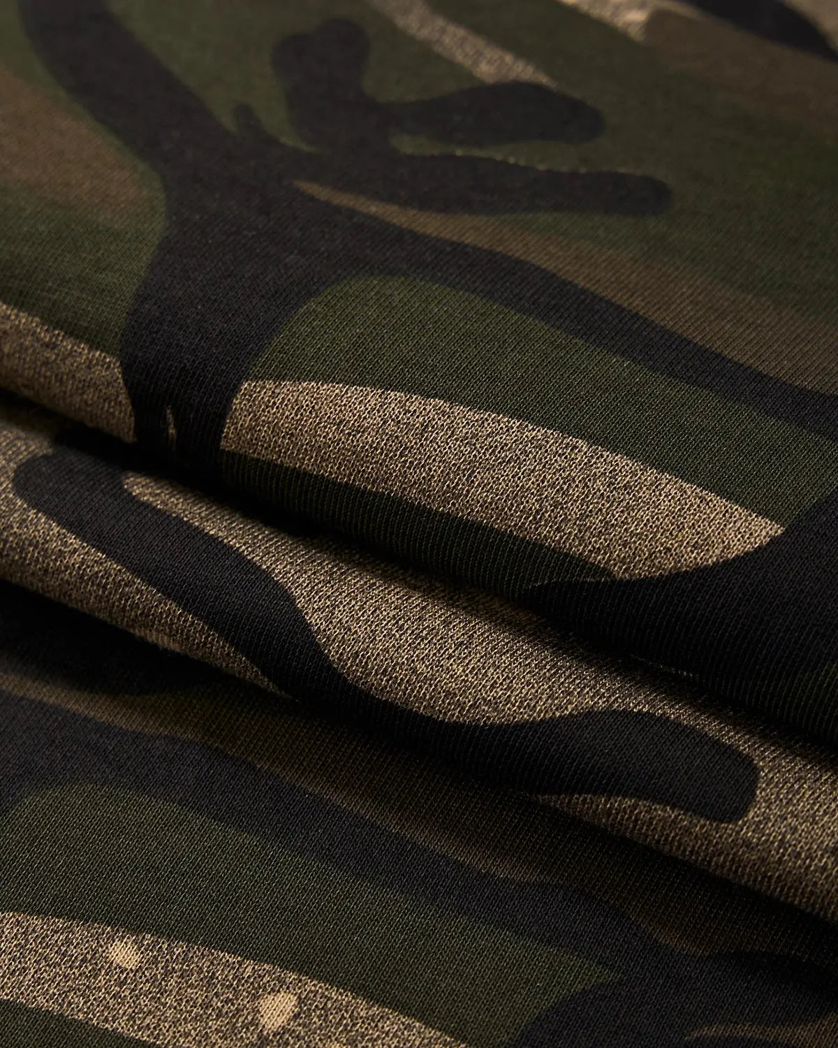 Flation boxy camo tee in khaki, streetwear style, featuring a relaxed fit and camouflage pattern on soft cotton fabric.