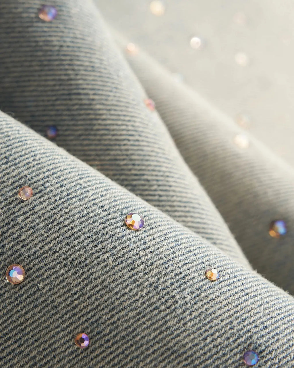 Washed rhinestone baggy jeans from Flation Streetwear, relaxed fit pants with rhinestone embellishments and distressed details.