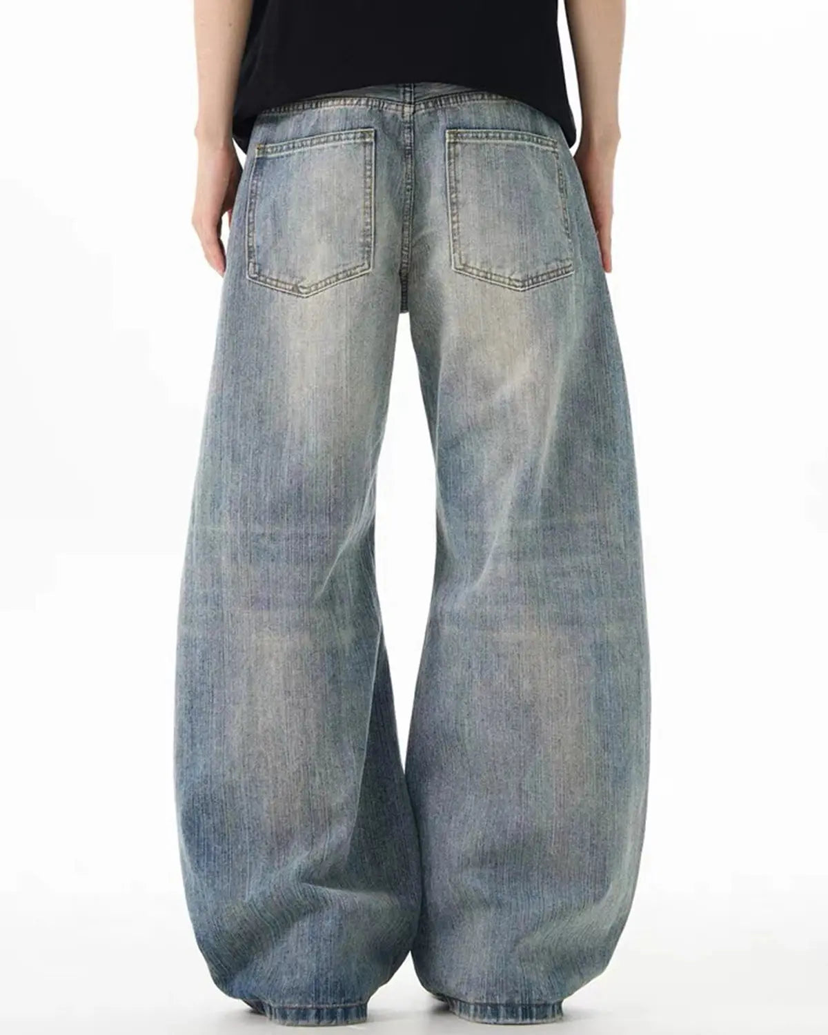 Bamboo weave distressed baggy jeans by INFLATION Streetwear featuring a relaxed fit and rugged denim texture.