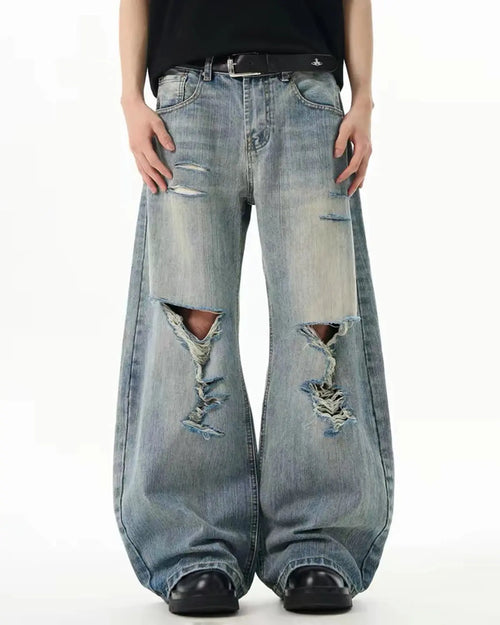 Bamboo weave distressed baggy jeans by Flation Streetwear, featuring a relaxed fit and stylish distressed details.