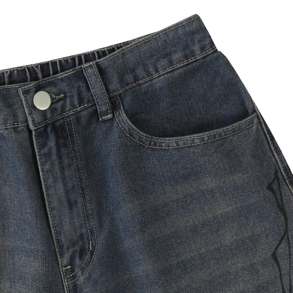 Flation Spider Straight Leg Jorts, denim pants with distressed details and a casual streetwear style, on a model.