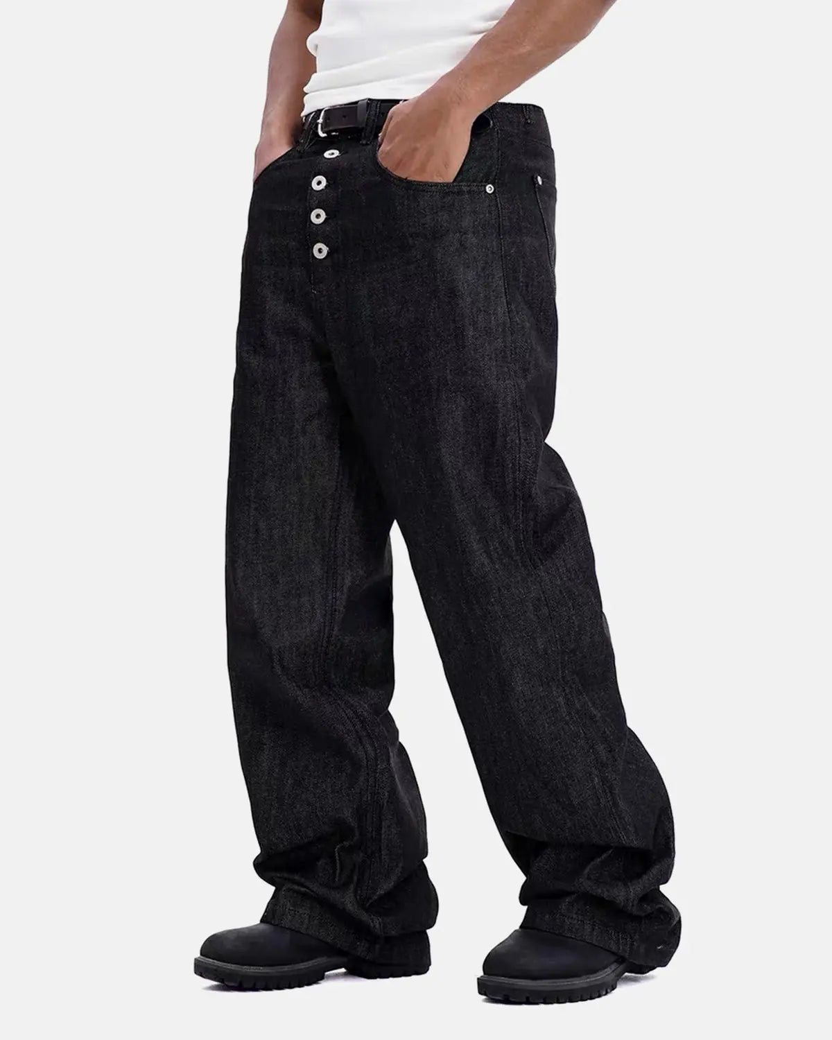 Raw baggy jeans with button details from Inflation Streetwear, featuring a relaxed fit and distressed denim style.