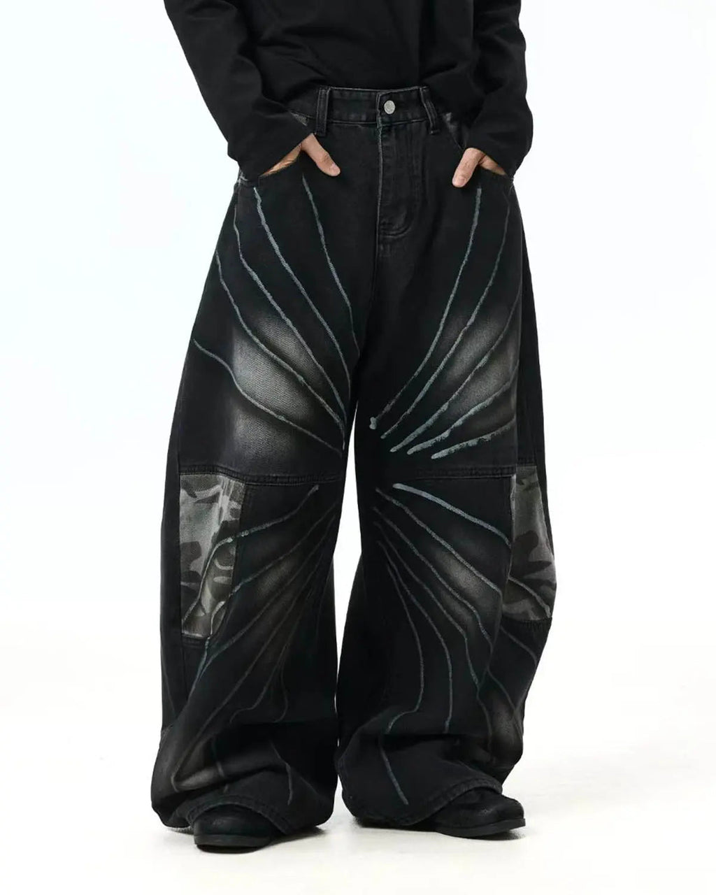 Inflation Spray Graphic Camo Barrel Jeans, stylish streetwear pants with bold spray paint camo pattern and relaxed fit.