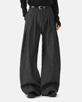 Vintage pinstripe pleated barrel jeans by INFLATION featuring a relaxed fit and stylish design, shown in the image.