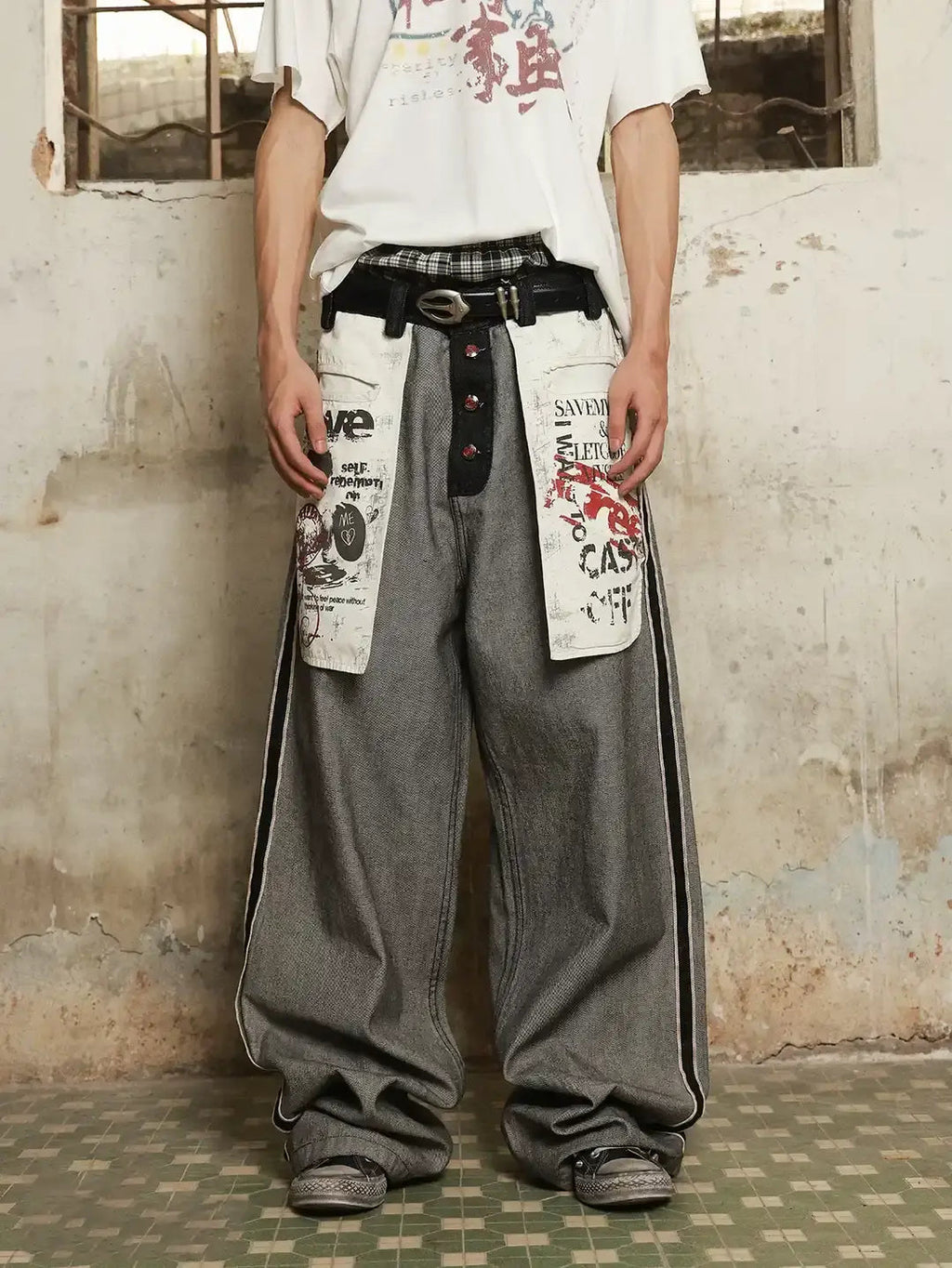 Distressed reverse design baggy jeans by INFLATION, featuring a relaxed fit with ripped details and a trendy streetwear look.