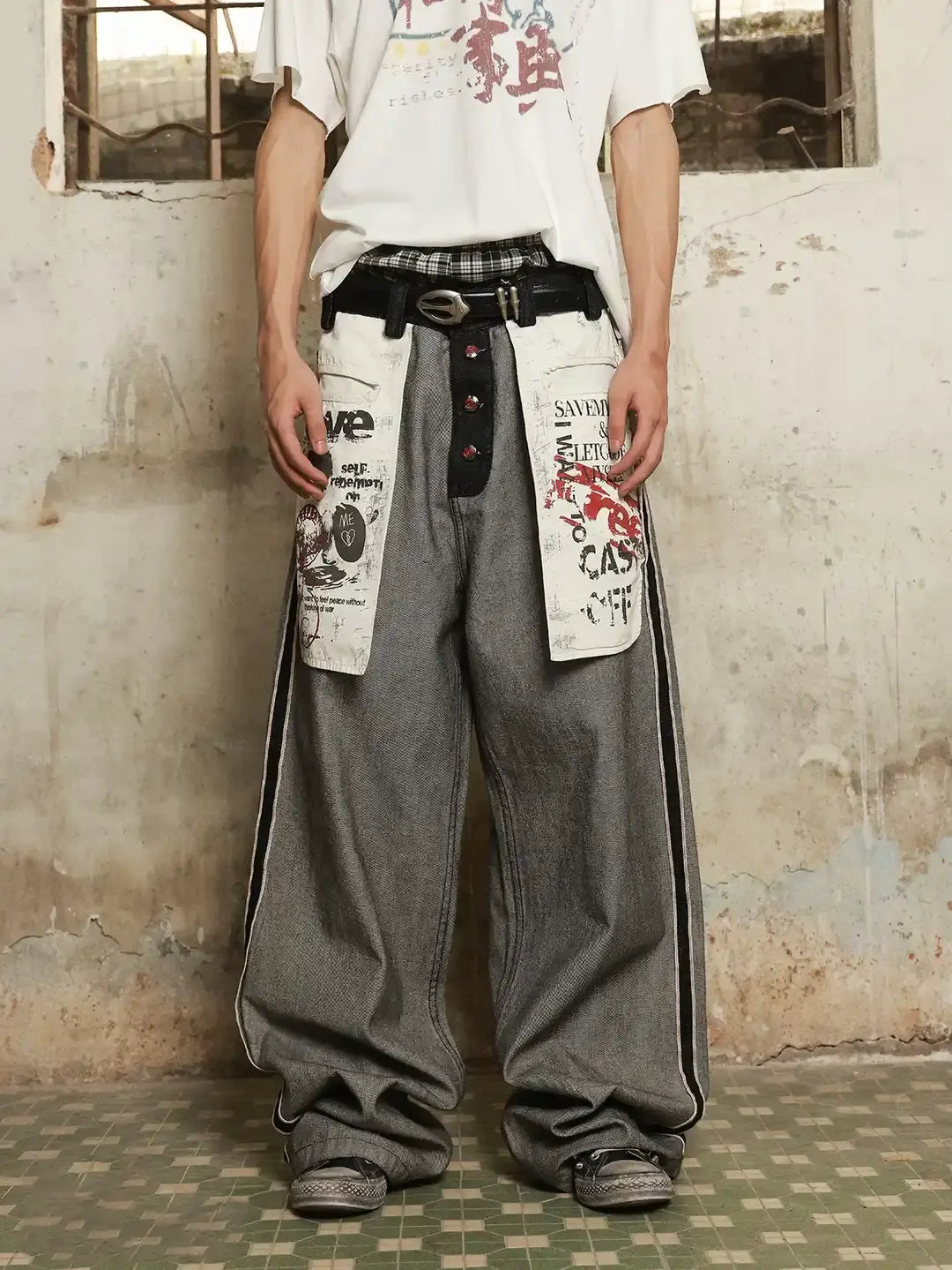Distressed reverse design baggy jeans by INFLATION, featuring a relaxed fit with ripped details and a trendy streetwear look.
