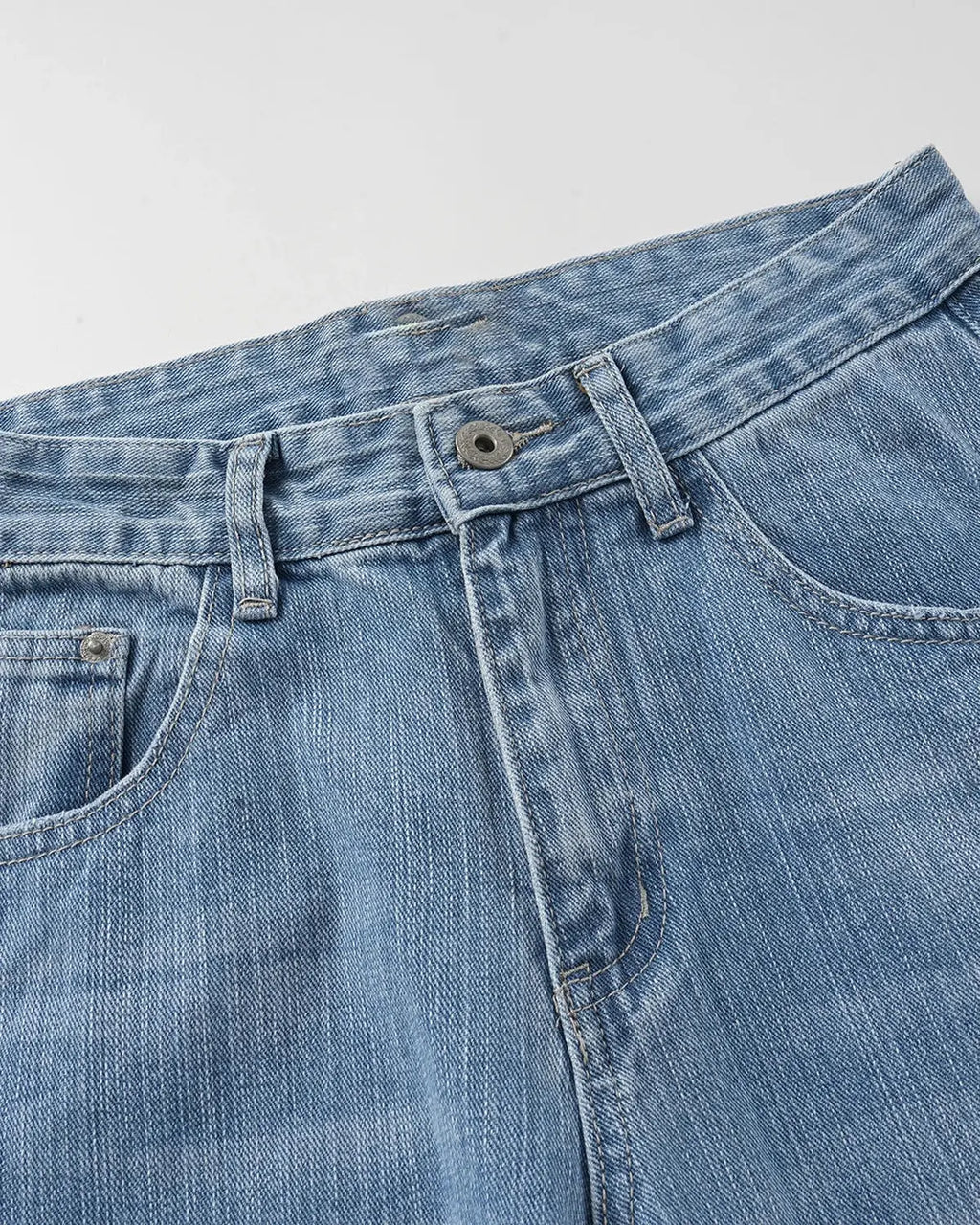Inflation Cross Stud Bamboo Weave Baggy Jeans with distressed details, relaxed fit, and unique woven bamboo accents.
