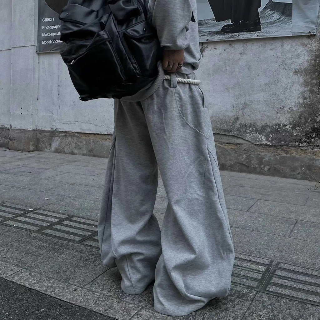 Flation Super Baggy Barrel Sweatpant in black, featuring a relaxed fit and stylish streetwear design, made from comfortable cotton fabric.