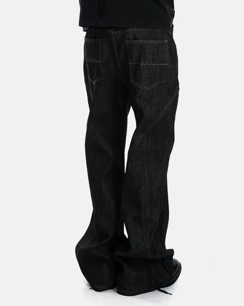 Inflation streetwear asymmetric button bootcut jeans with stylish design, visible button details and classic denim fabric.