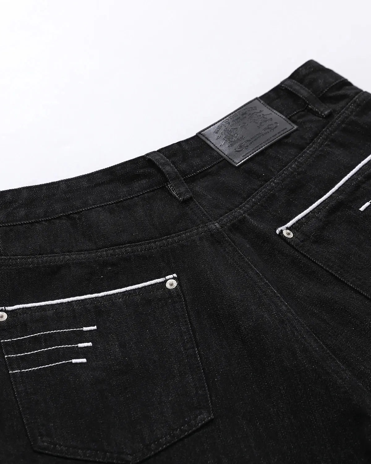 Inflation Streetwear longline wide-leg jorts pants with distressed denim and frayed hems, casual streetwear style.