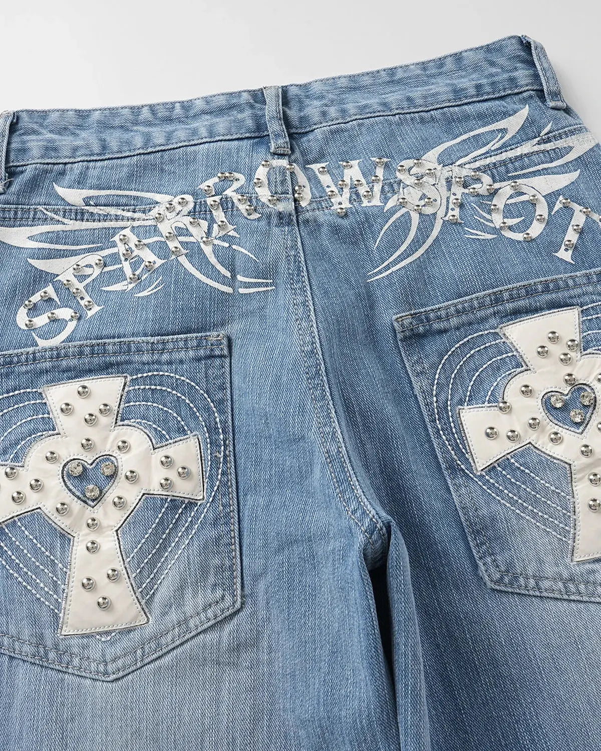 Inflation Cross Stud Bamboo Weave Baggy Jeans featuring distressed denim, relaxed fit, and bamboo-inspired design elements.