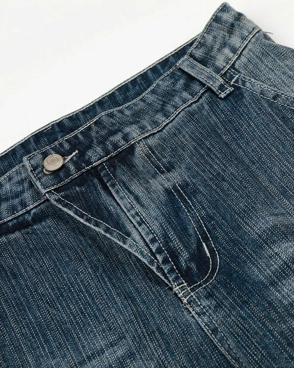 Textured bamboo weave denim jeans by INFLATION, stylish pants with a unique woven fabric, shown in a natural pose.