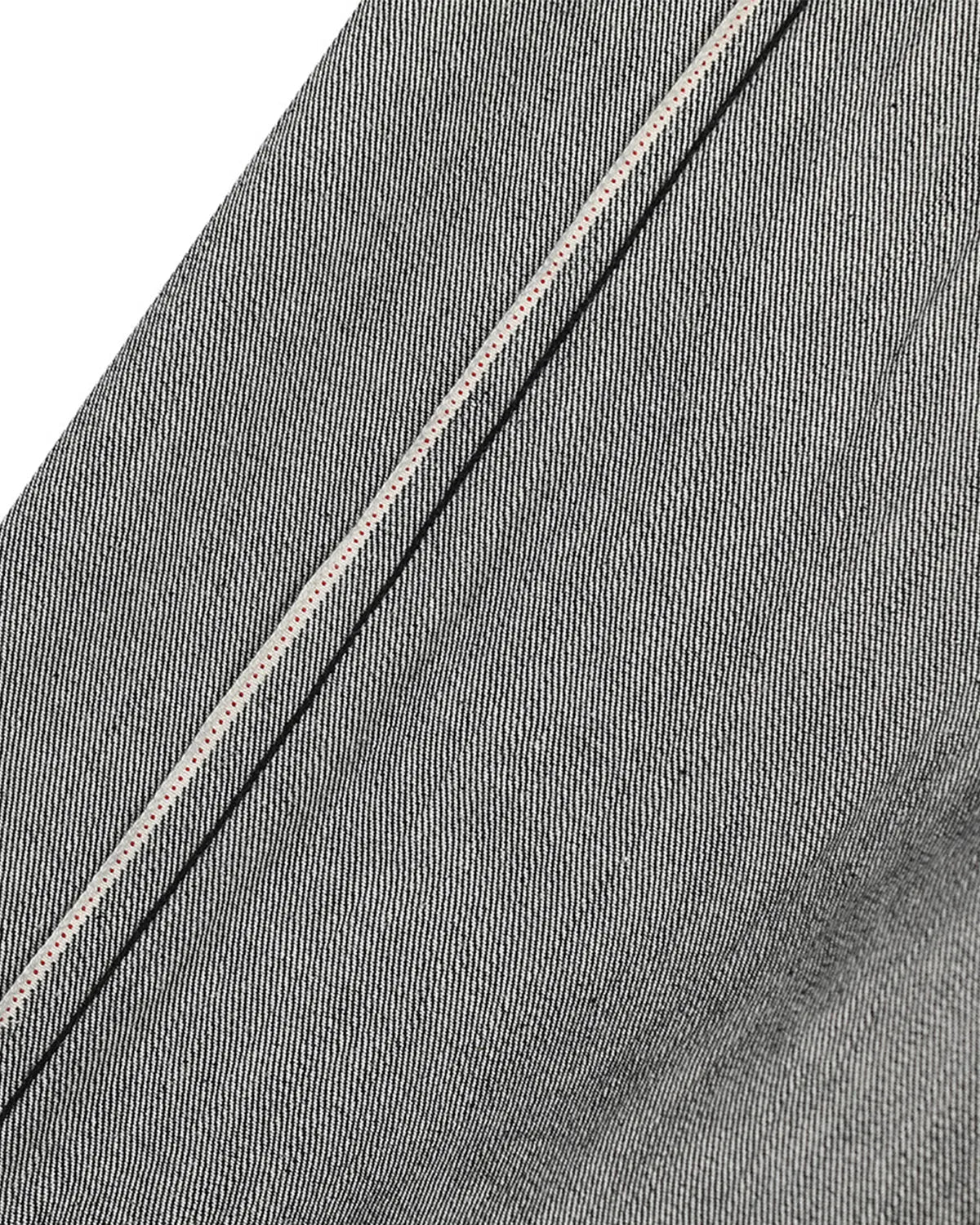 Raw straight-leg denim pants by INFLATION featuring classic blue denim fabric and a relaxed fit, displayed hanging on a plain background.
