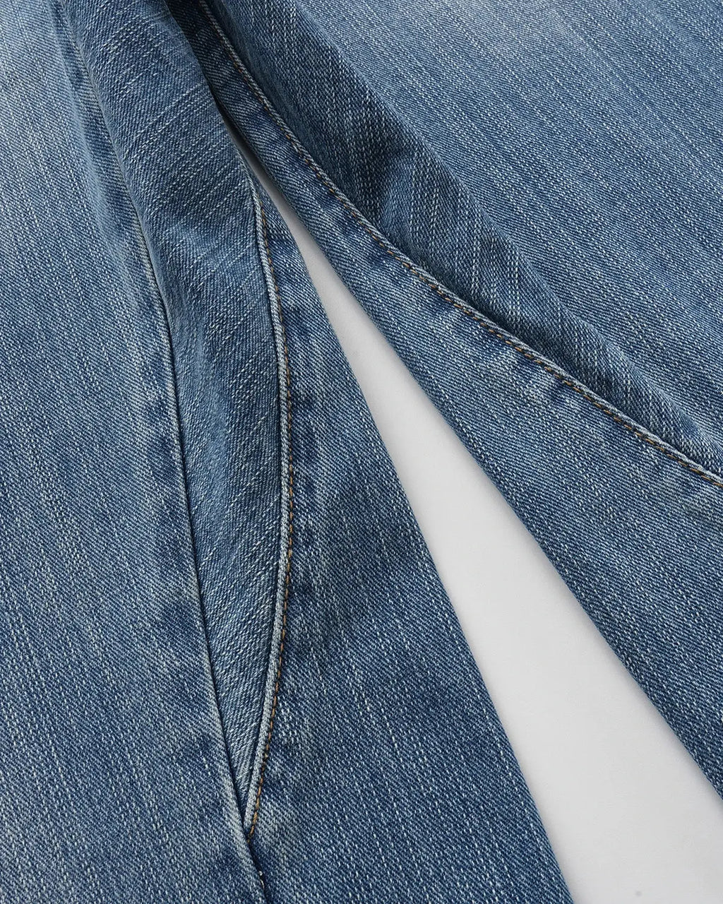 Bamboo weave cinch back baggy jeans by INFLATION Streetwear with relaxed fit and wide leg style, showing front view and adjustable waist.