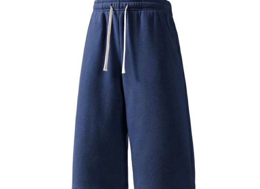 Flation Trending Long Jogger Shorts in neutral color, featuring relaxed fit and elastic waistband, designed for casual comfort.