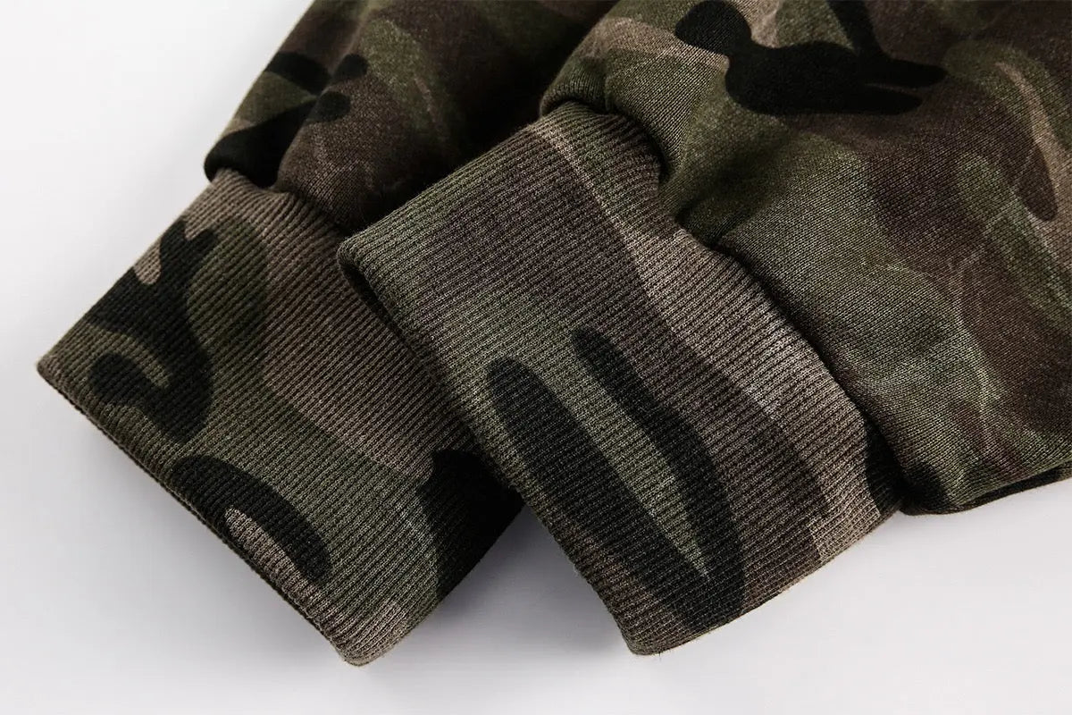 Camouflage zip-up jacket by Flation Streetwear with a hood and front pockets, showcasing a stylish streetwear design.