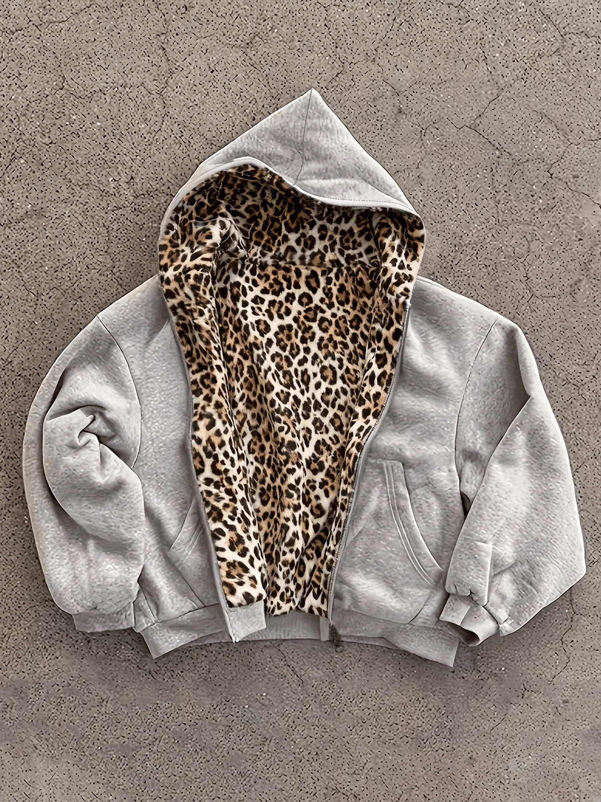 Flation streetwear zip-up jacket with leopard print design, featuring a stylish and comfortable fit.